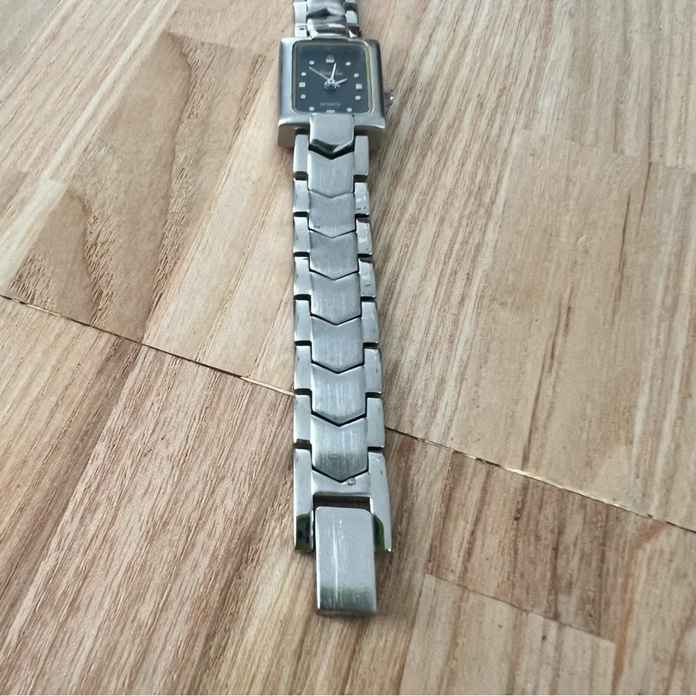 Vanity fair ladies rectangular silver tone watch NEW BATTERY